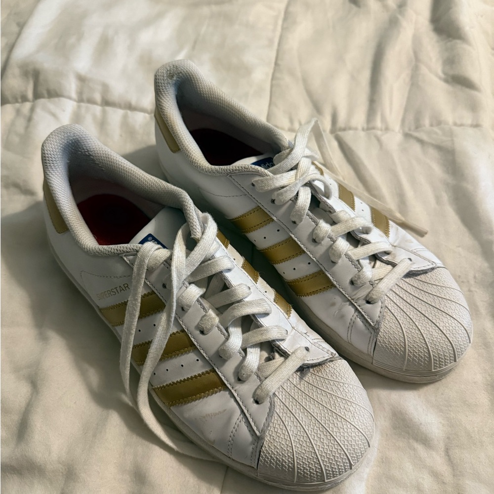 Adidas Women's White and Gold Striped Sneakers